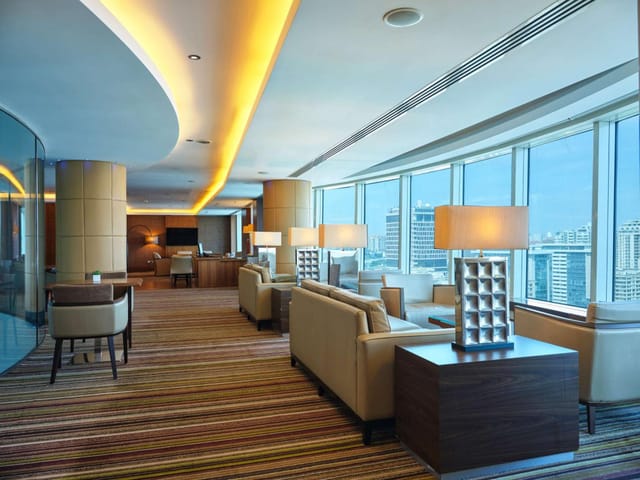 Modern Hotel Baku executive lounge with skyline view for VIP meetings and corporate networking.