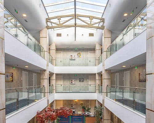 Midway Baku Hotel atrium for event venue hire, modern multi-level corporate space.