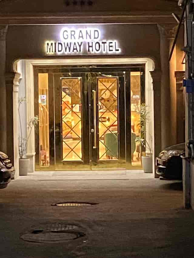 Boutique Midway Baku Hotel entrance, narrow entryway for event check-in and guest arrivals.
