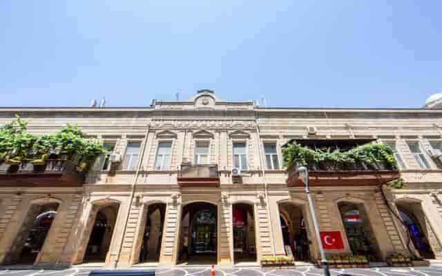 Historic Midway Baku Hotel venue with arched architecture for upscale receptions and events.