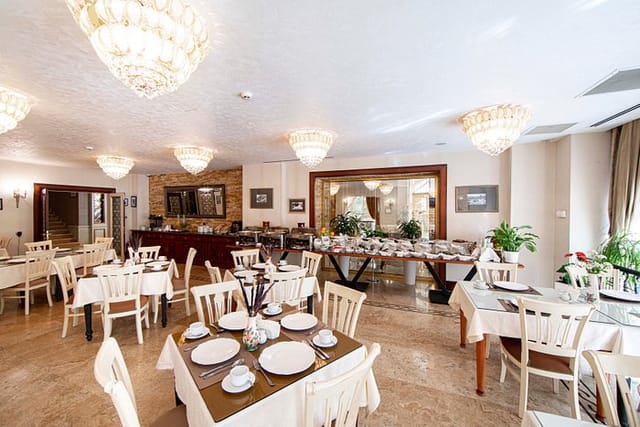 Sapphire Hotel banquet hall with buffet setup, ideal for corporate events and wedding catering.