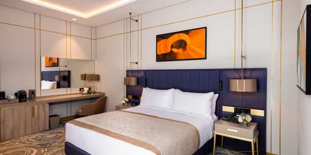 Luxury hotel suite in InterContinental Baku featuring workspace for VIP corporate business events.
