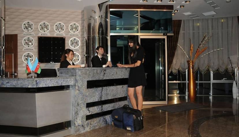 IRON Hotel reception desk for conference check-in and event registration.