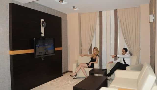 VIP breakout suite at Iron Hotel conference hall for executive meetings and corporate networking.