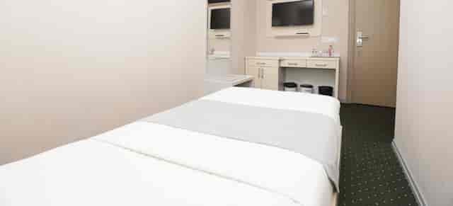 Budget-friendly hotel room at Altus Hotel Baku, ideal for event lodging and short-stay travel.