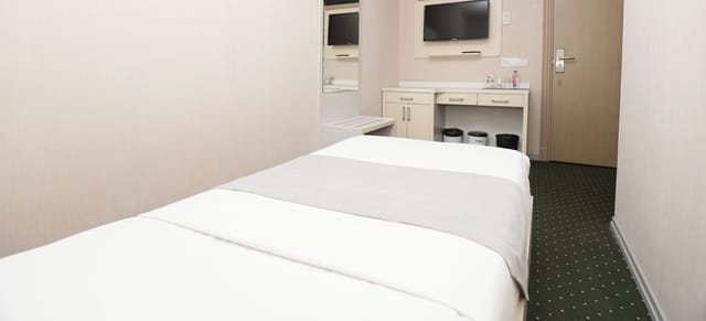Budget-friendly hotel room at Altus Hotel Baku, ideal for event lodging and short-stay travel.