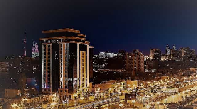 Mövenpick Winter Park Baku bar, panoramic city skyline for corporate networking and gala events.