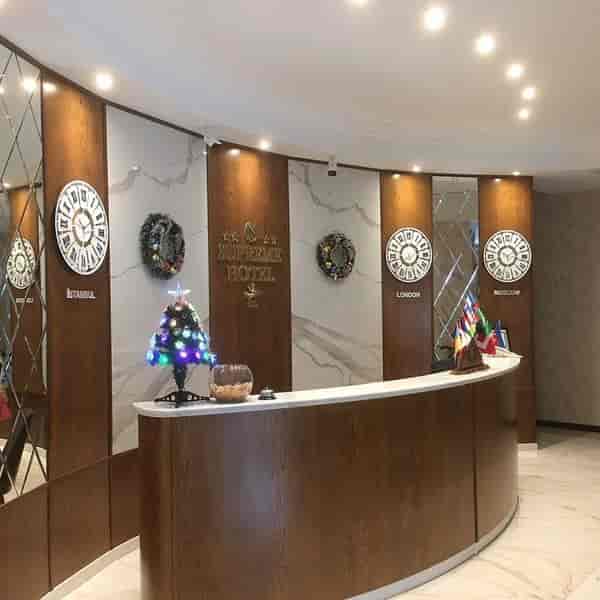 Supreme Hotel reception desk for business travel and corporate room-block bookings.