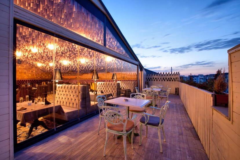 Teatro Boutique Hotel rooftop lounge: luxury indoor-outdoor venue for VIP networking and receptions.