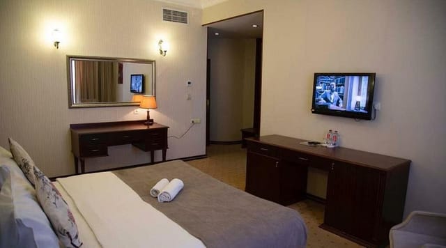 Capitol Hotel suite featuring a functional workspace for business travel and corporate stays.