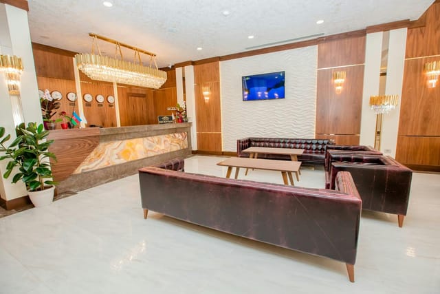 Modern Addison Hotel lobby with professional seating for event registration and networking.