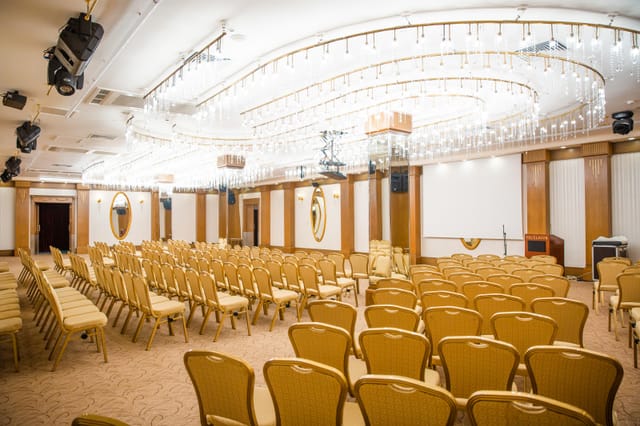 Theater-style ballroom at Excelsior Hotel Baku for corporate conference and event presentations.