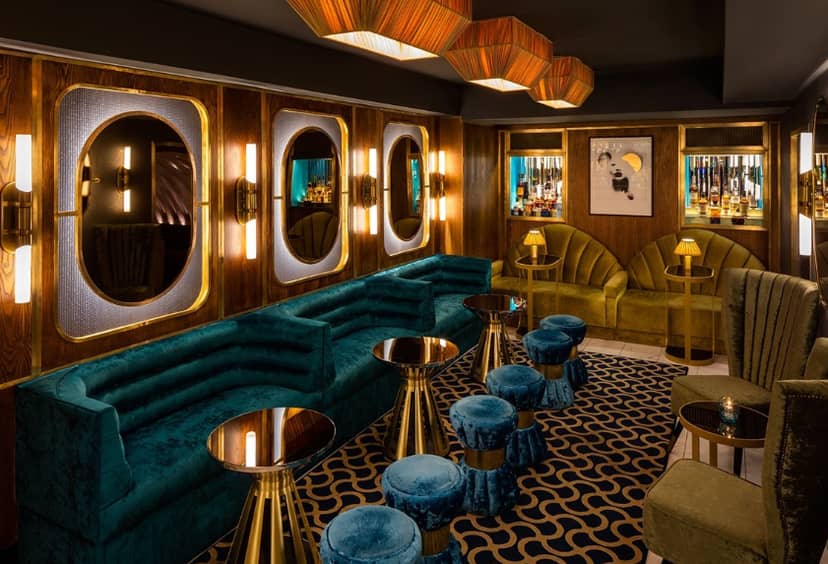Private dining at Drip London lounge with moody lighting for VIP networking and cocktail events.