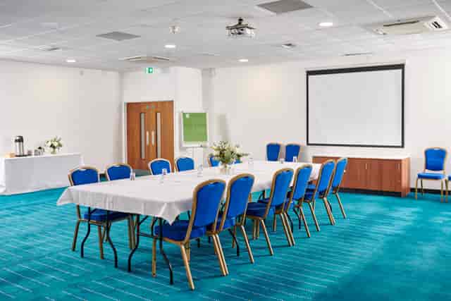 Conference Centre at Butlin's Bognor Regis with central table setup for professional meetings.