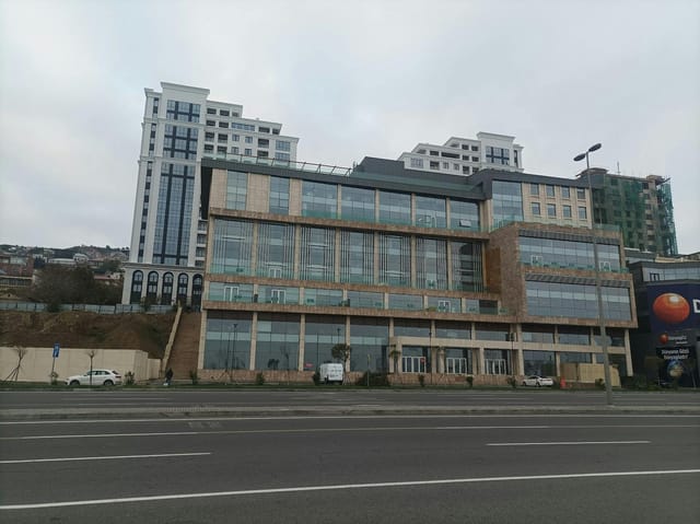 Bayil Plaza business center with glass frontage, ideal for corporate conferences and events.