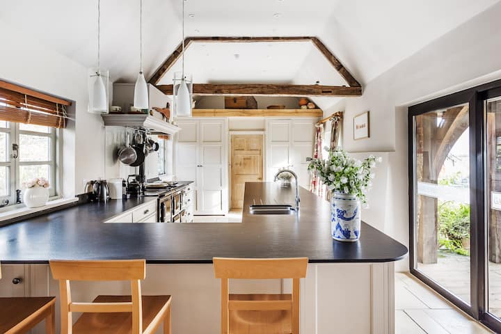 The Farmhouse at Gate Street: intimate breakout space for corporate retreats and culinary workshops.