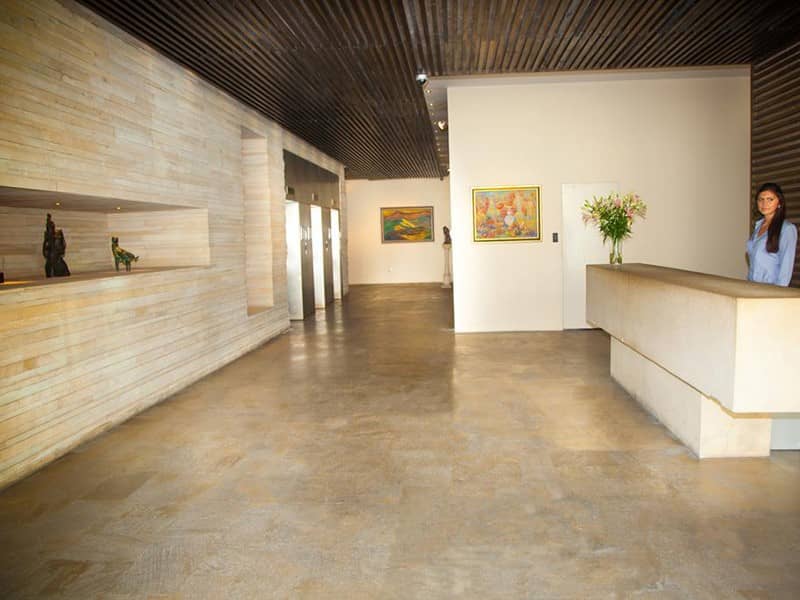 Minimalist reception area in The Rotunda-1, ideal for exclusive event registration and check-ins.