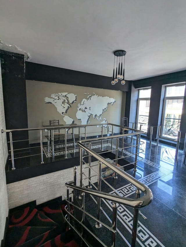 Gallery Lux Hotel Baku restaurant with global map wall for corporate events and workshops.