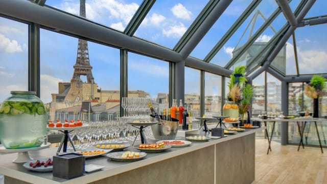 Eiffel Tower view meeting room in Le Toit for luxury corporate events and VIP networking.