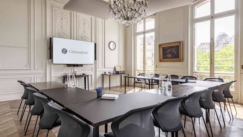 U-shape boardroom in historic French meeting room for executive sessions and client meetings.