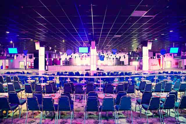 Centre Stage venue with blue lighting for corporate events or evening functions.