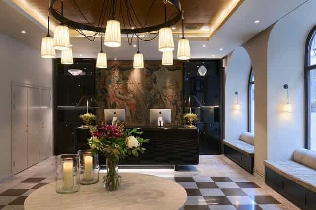 Hotel Villa Dagmar reception area for executive corporate events and registration setups.