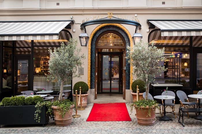Red carpet entrance at Hotel Villa Dagmar, boutique venue for corporate events and VIP receptions.