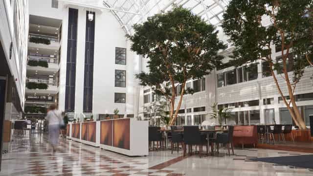 Piazzan atrium at World Trade Center Stockholm, bright event space for registration and networking.