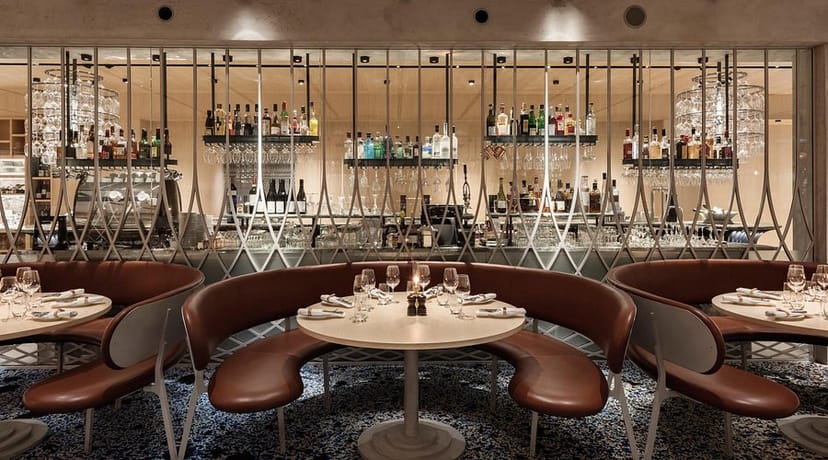 Pinnrummet restaurant semi-private booths for high-end corporate dinners and networking events.