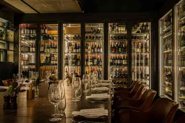 Pinnrummet private dining room with wine wall for VIP dinners and boardroom events.