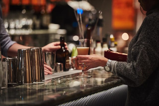 Upscale Hillenberg cocktail bar for professional conference networking and business events.