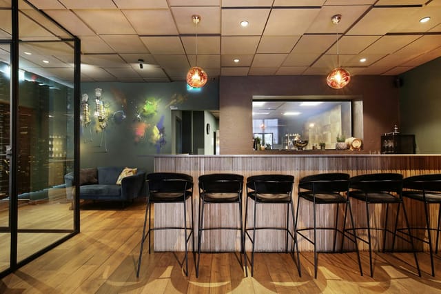Modern lounge breakout area for professional networking and corporate events.