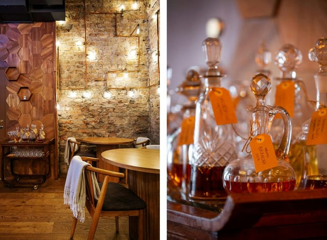 High-end restaurant breakout space with industrial lighting for executive networking and tastings.