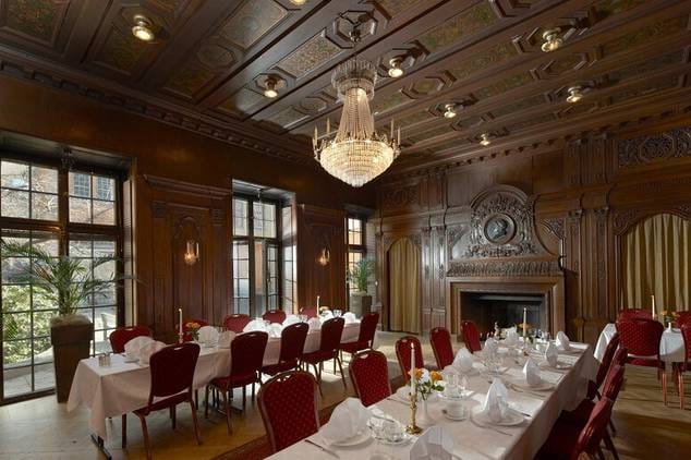 Elegant wood-paneled boardroom in Van der Nootska Palatset for VIP corporate dinners and retreats.