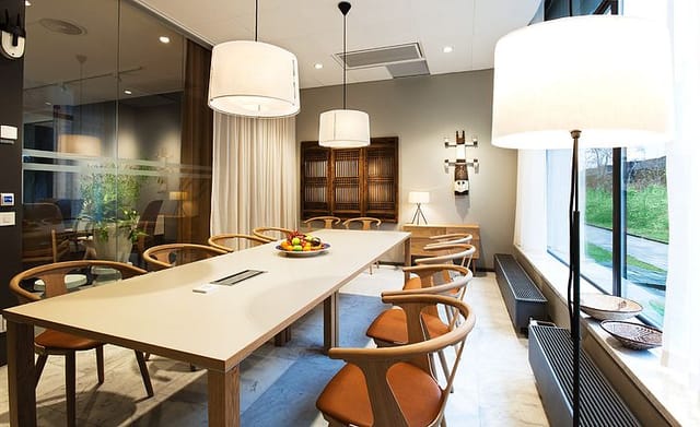 Modern Scandinavian boardroom for executive strategy meetings and VIP corporate events.