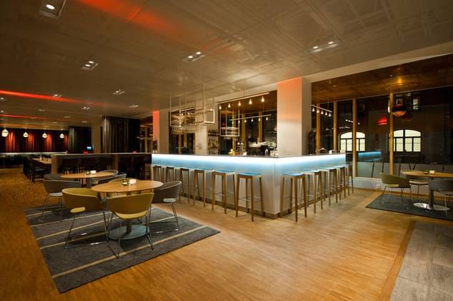 Modern bar area at Hotel Birger Jarl for corporate networking receptions and conference events.