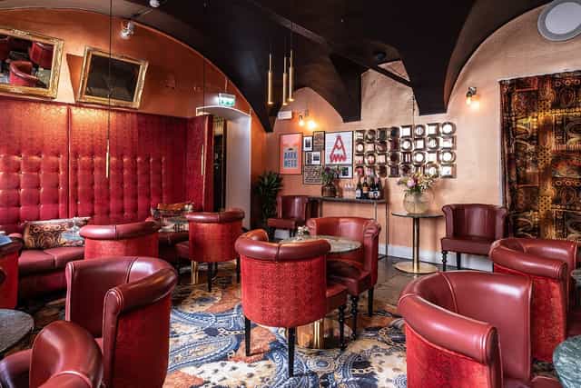 Club NOFO luxury lounge with textured decor, perfect for VIP networking and breakout sessions.