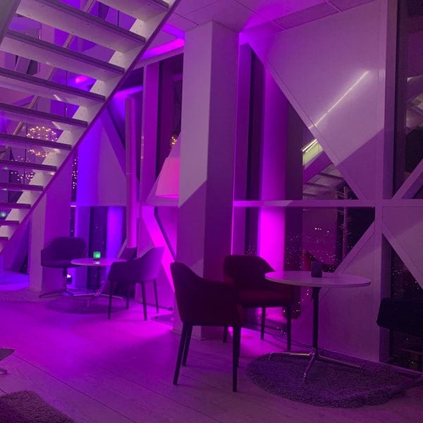 Modern VIP networking bar at Scandic Victoria Tower with dramatic LED lighting for cocktail events.