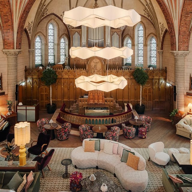 Soho House Stockholm lounge: historic venue featuring modern furniture for corporate events.