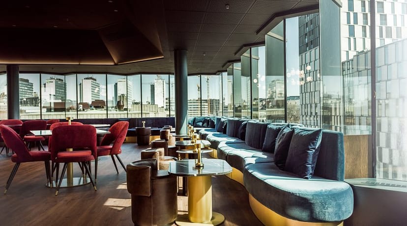 Luxury lounge with city views for upscale networking and corporate cocktail events.