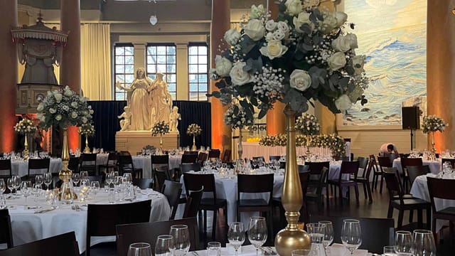 Gala setup at Sailing Hall with gold centerpieces for elegant event and venue hire.