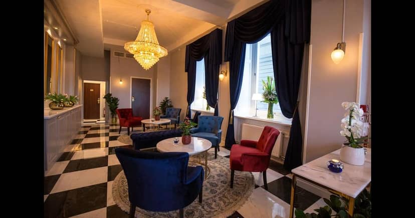 Elegant velvet lounge in Hotel Gamla Stan Stockholm, ideal for VIP networking and event breakout.