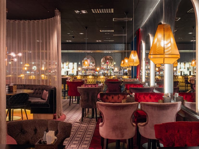 Haga Bottega luxury lounge with velvet seating for VIP hospitality and executive networking events.