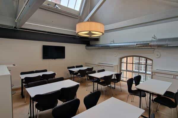 Industrial breakout room for small group workshop or training at Cuisinen Nacka Strand.