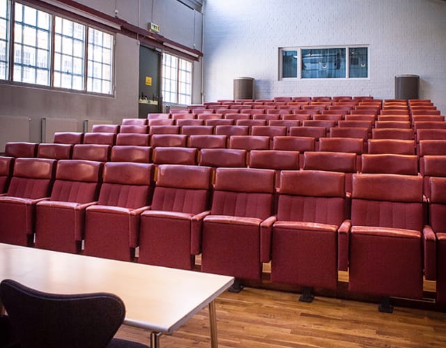 Nacka Strand industrial lecture hall with tiered seating for corporate training and keynote events.