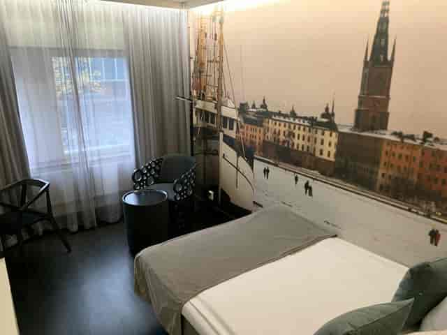 Compact guest room at Vatos Hotel C Stockholm for business travel accommodation.