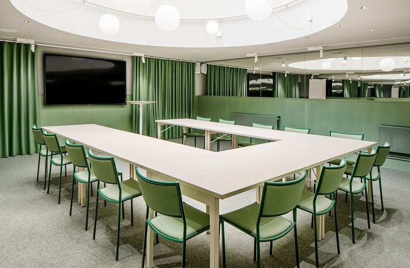 U-shape boardroom at Hotel Stureplan with AV screen for corporate workshops and business meetings.