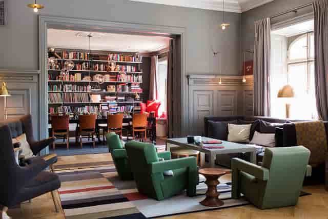Luxury library event space in Ett Hem Stockholm for board meetings and workshops.