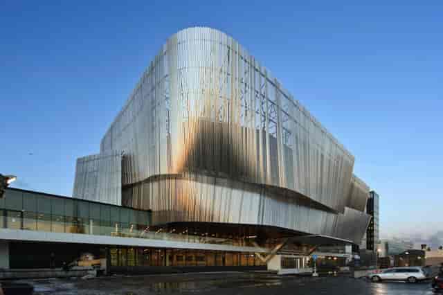 Modern waterfront business center with architectural design for corporate events and conferences.