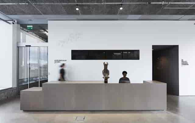 Minimalist registration desk at Bonniers Konsthall for corporate events and art exhibitions.